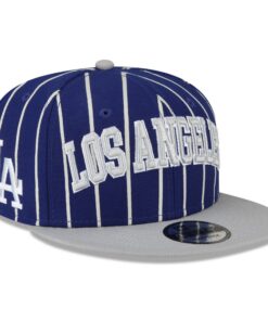 New Era - Casquette Ajustable 9fifty de Baseball et Basketball pour Sports Américains - Collection City Arch